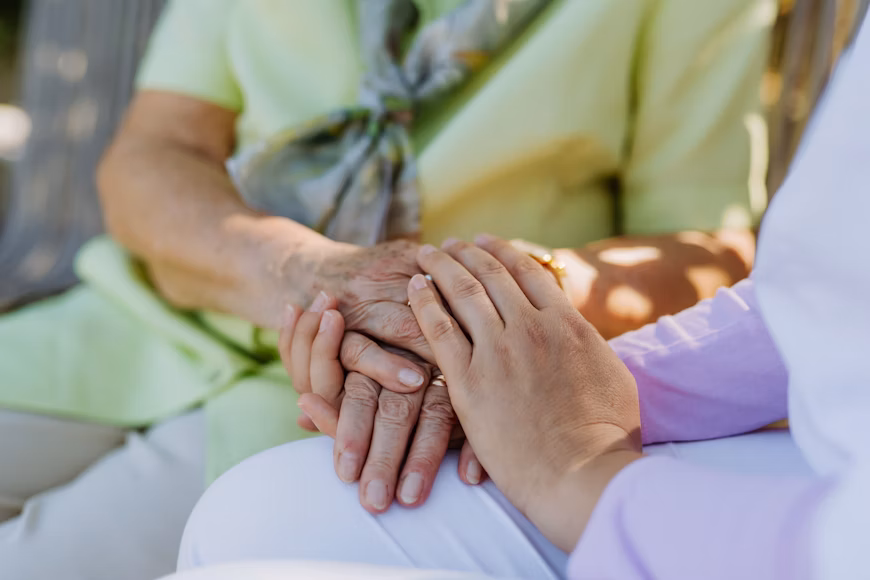 Caregiver talking with a senior at home